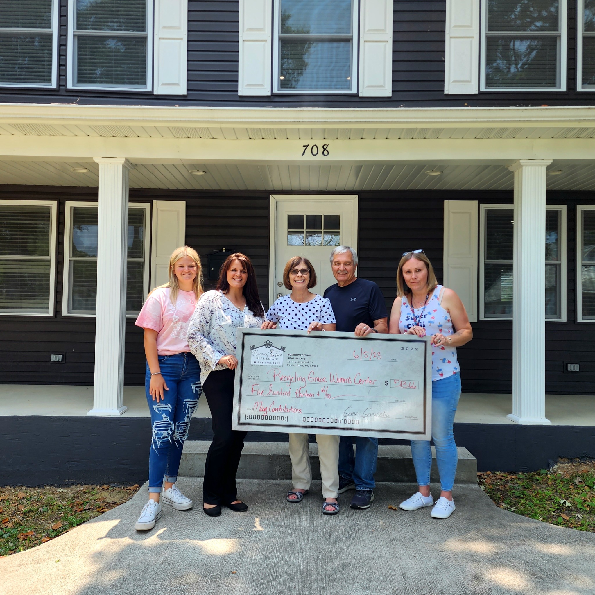 Gina Ginocchio and Hope Hunter presenting donation check to Sandra Mick-Shockey, Brent Shockey and Mitzi Moss at their newest recovery addition, the Ruth House.