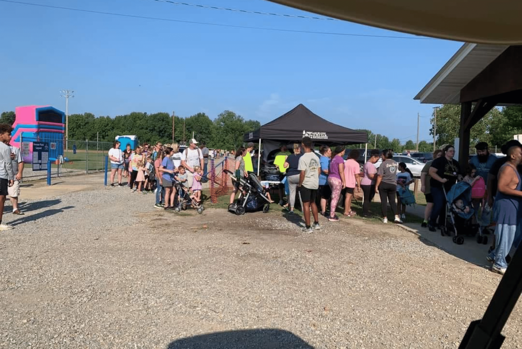 Borrowed Time Real Estate supporting kids and families at the Back to School Bash with school supplies.