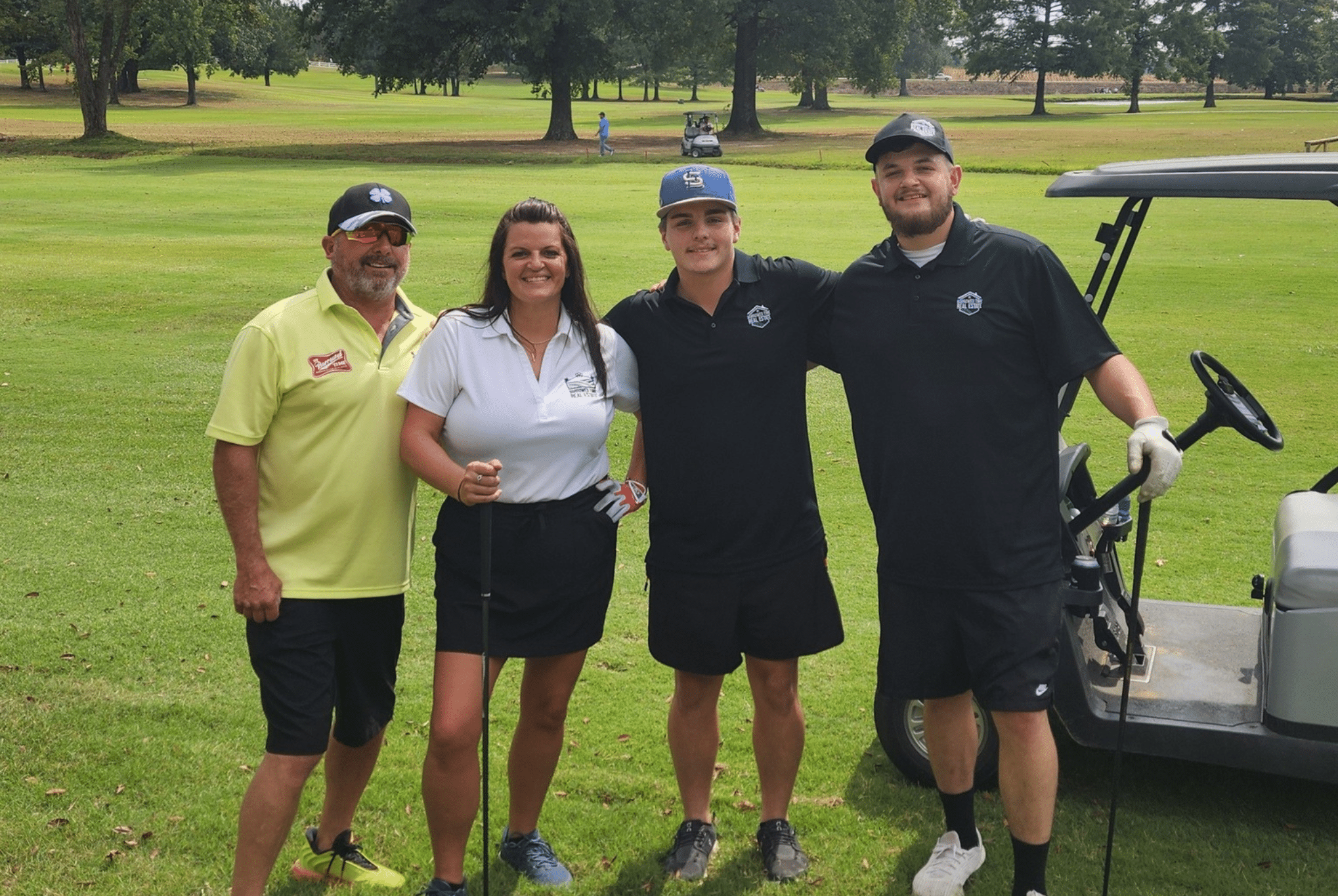 Borrowed Time Real Estate team participating in the Eric Simmons 4th Annual Golf Tournament benefiting FosterAdopt Connect.