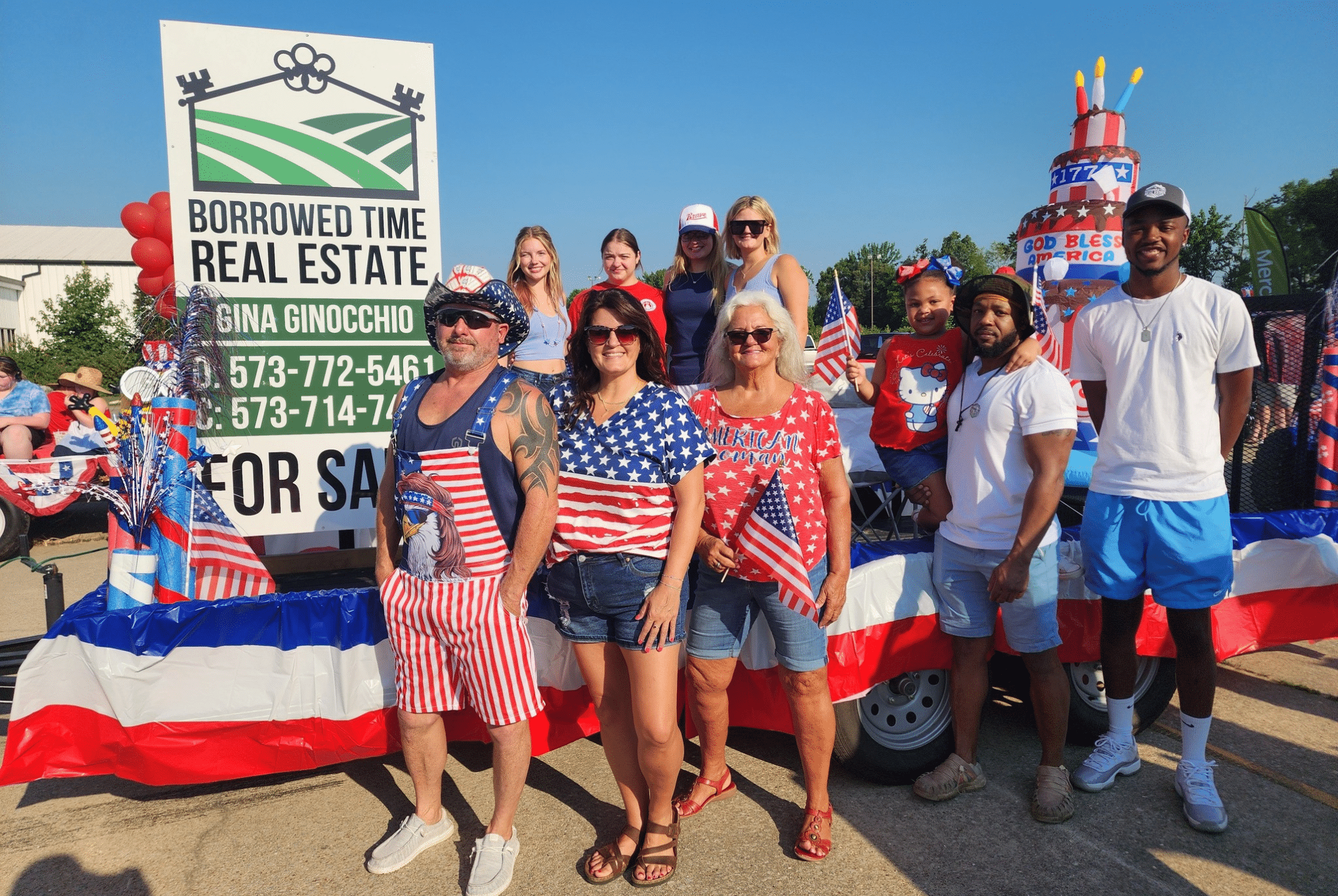 Borrowed Time Real Estate participating in the Daily American Republic Independence Day Parade.