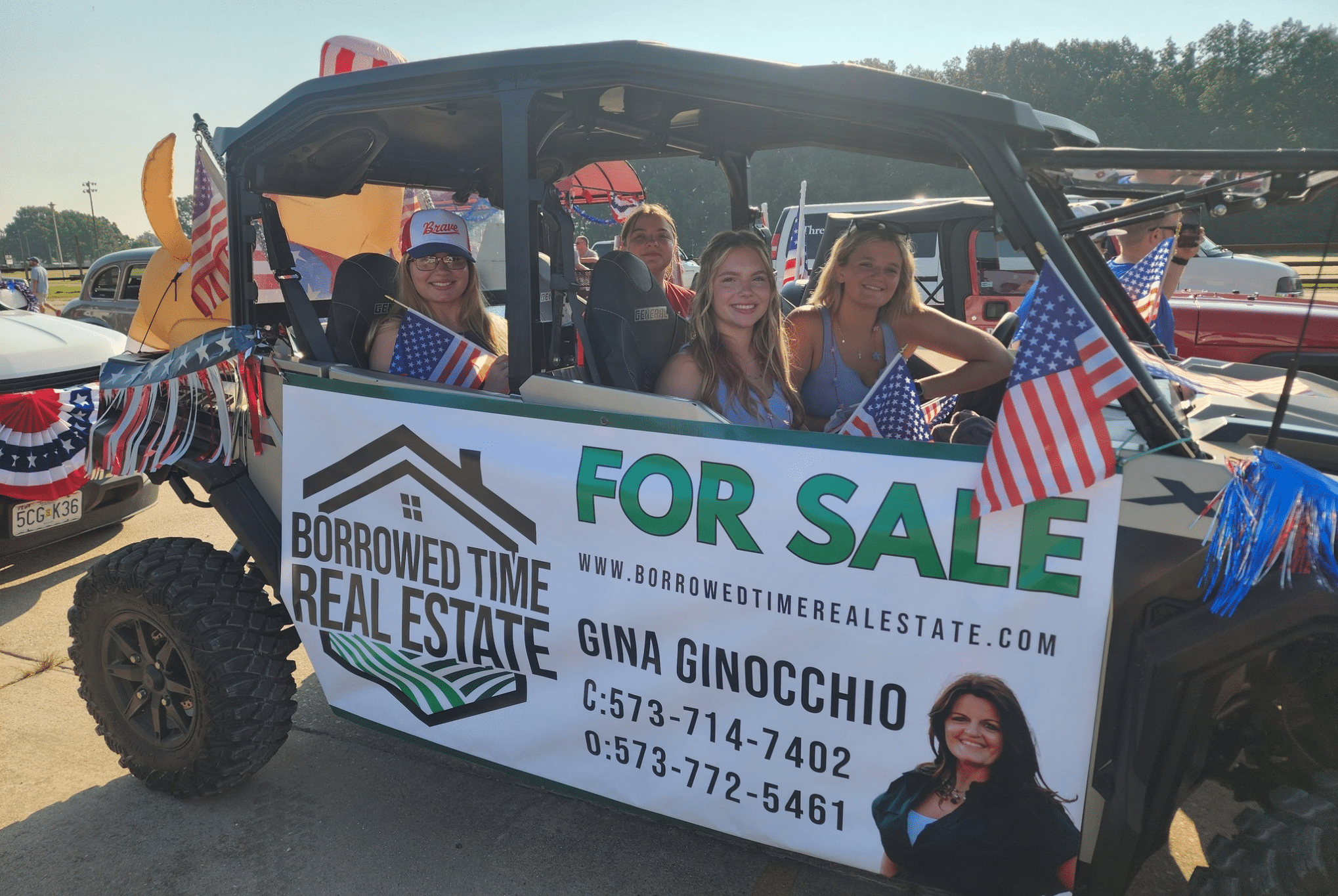Borrowed Time Real Estate celebrating Independence Day at the Daily American Republic parade in Poplar Bluff.