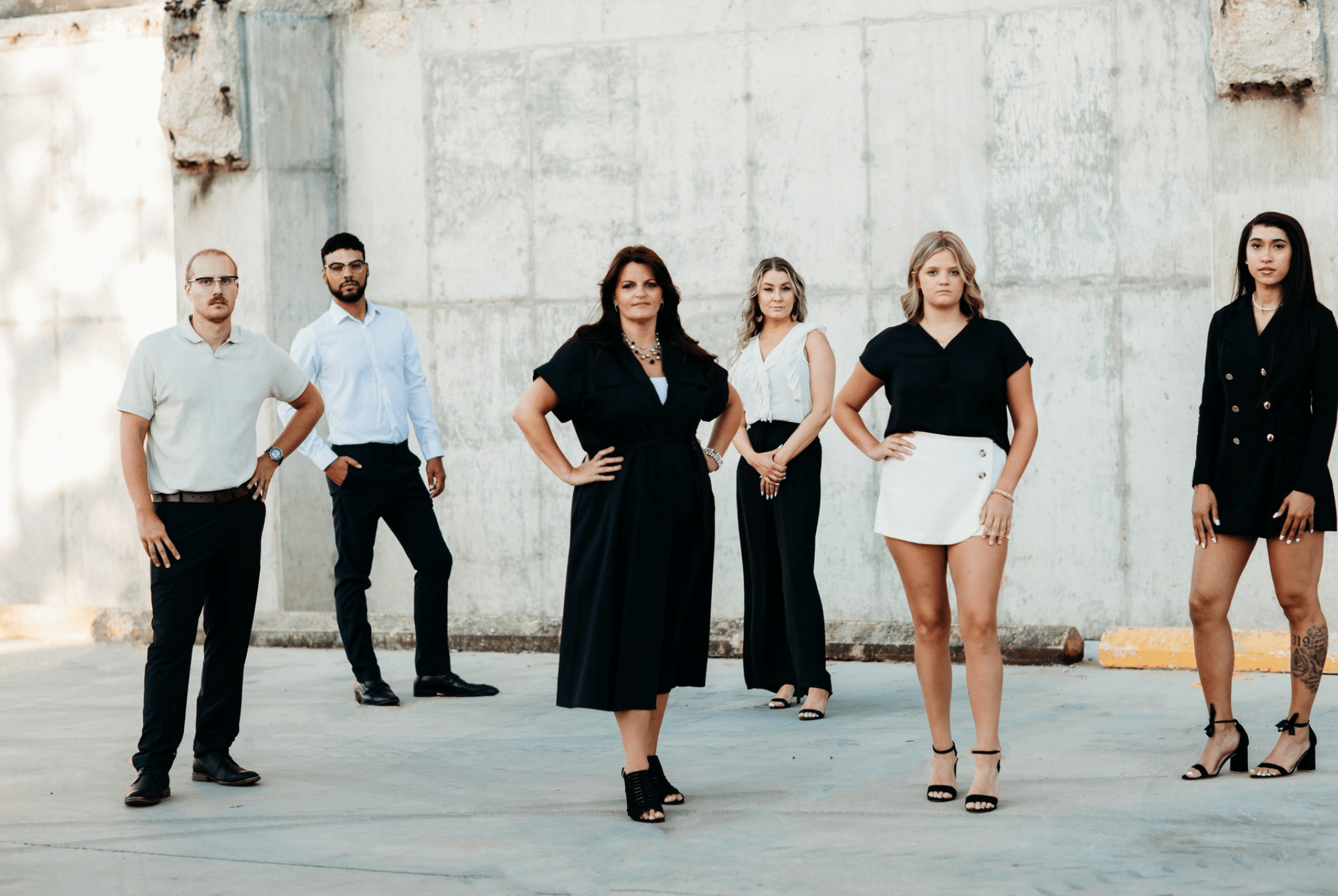 Borrowed Time Real Estate team photo taken during a July branding session in Poplar Bluff.