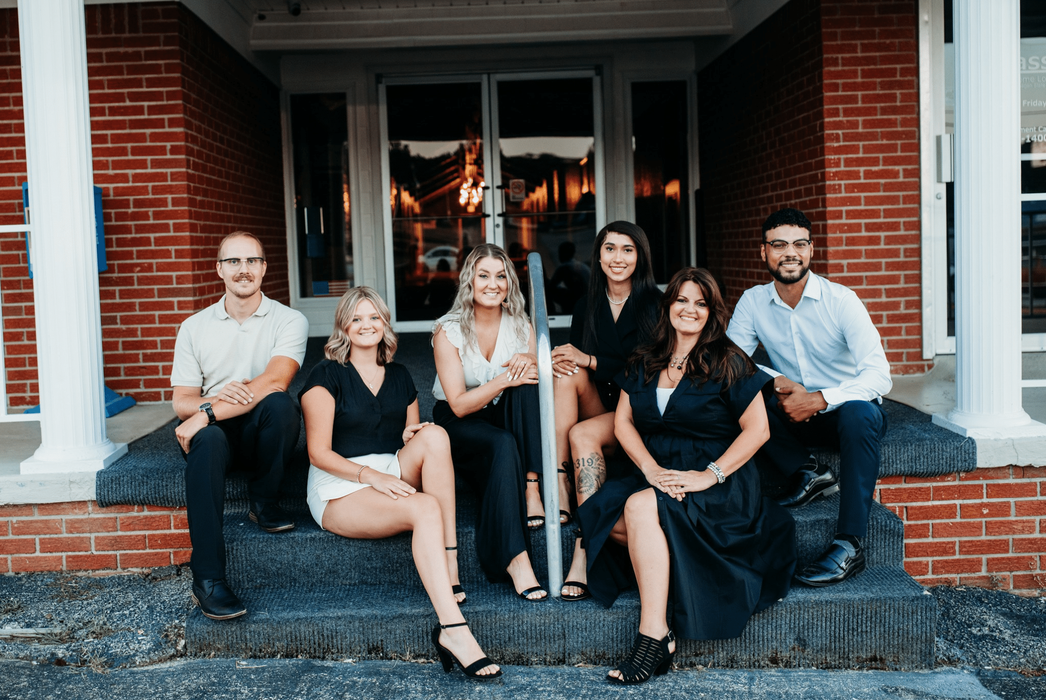Borrowed Time Real Estate team posing during a professional branding photoshoot.