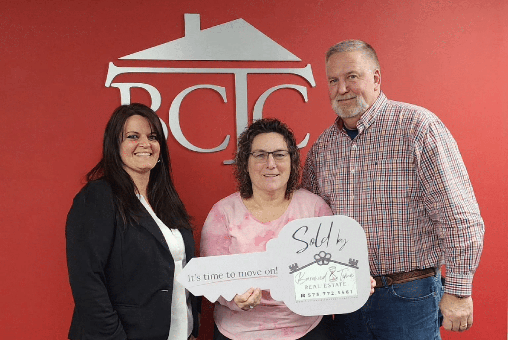 Home sellers celebrating closing day after selling property in Forest Meadow Subdivision