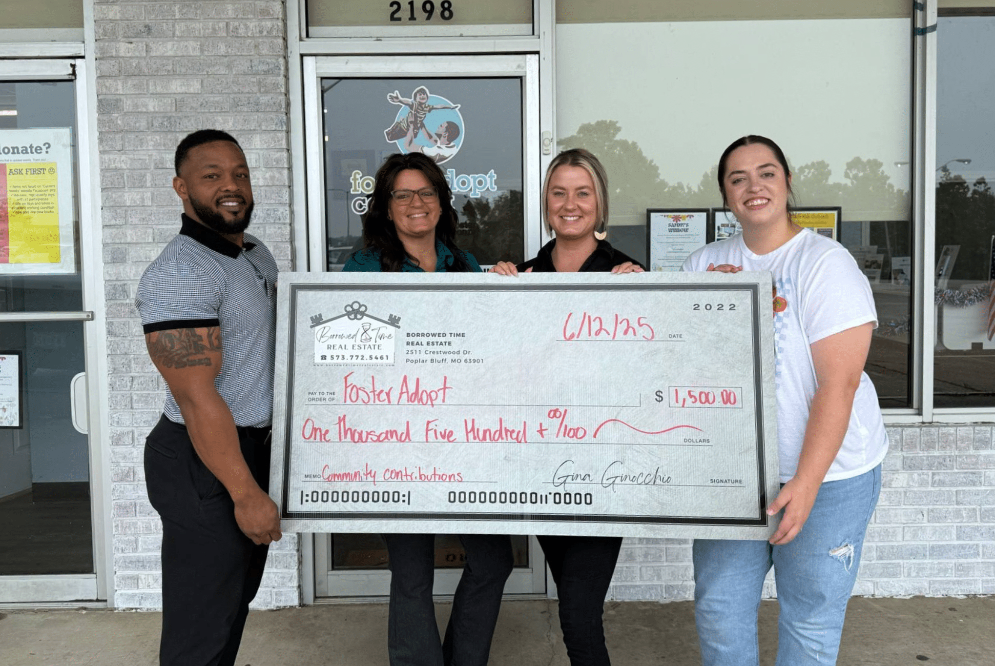 Borrowed Time Real Estate presents a donation check to FosterAdopt Connect Poplar Bluff supporting children and families in the foster care system.