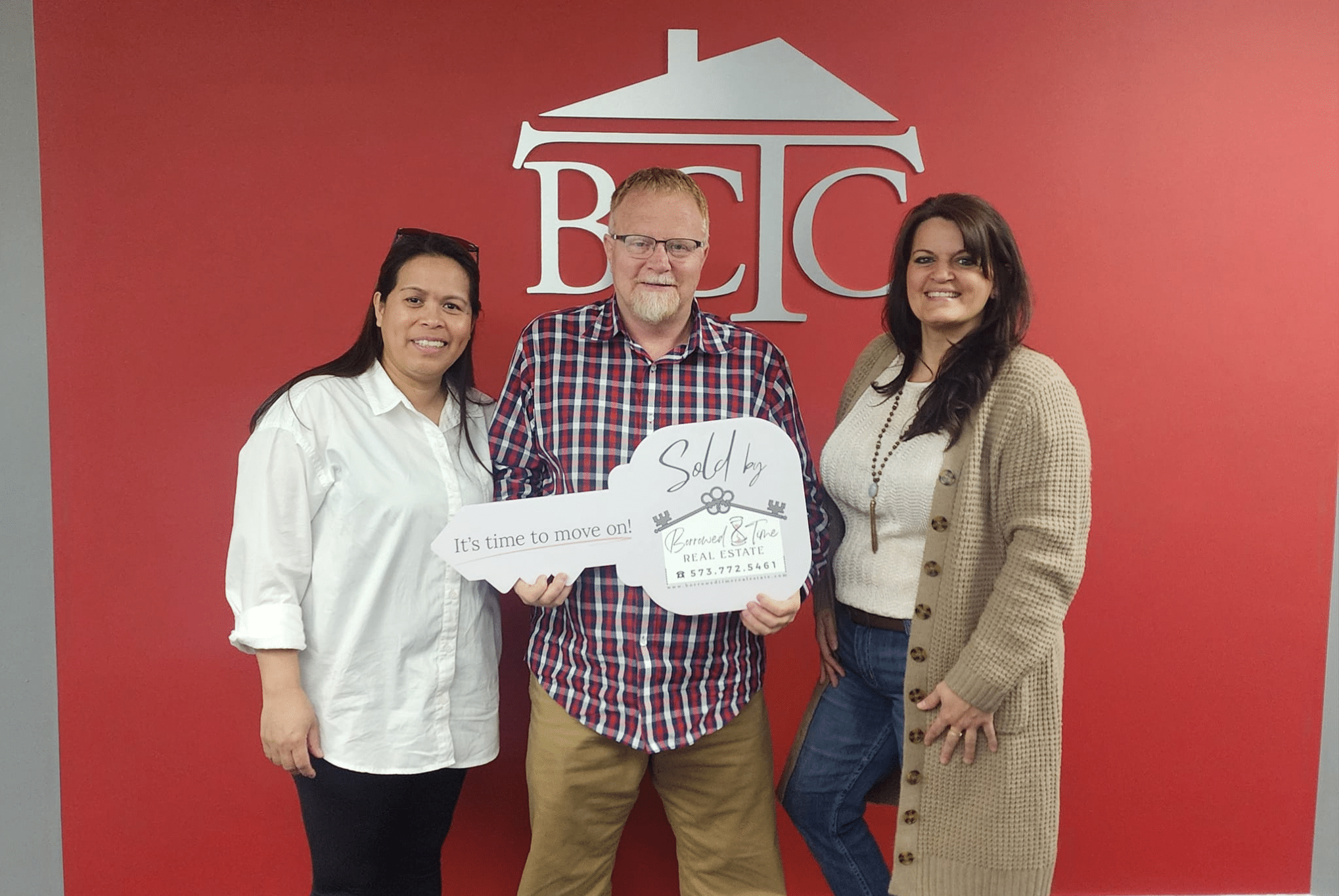 Property sellers celebrating closing after selling Puxico Missouri real estate