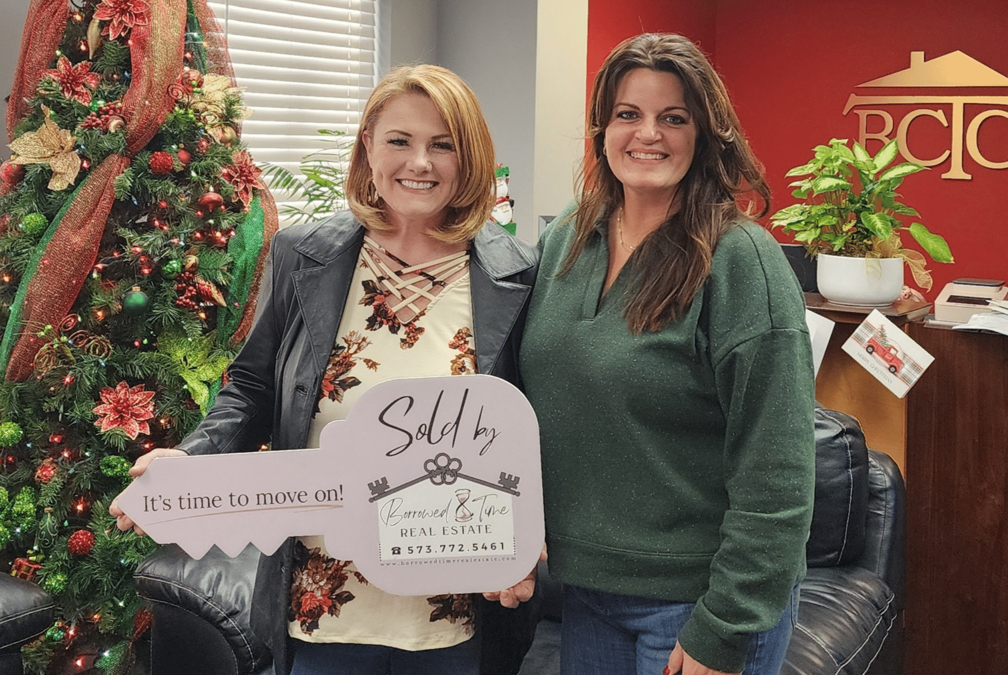 Home seller celebrating closing day after selling property with Borrowed Time Real Estate
