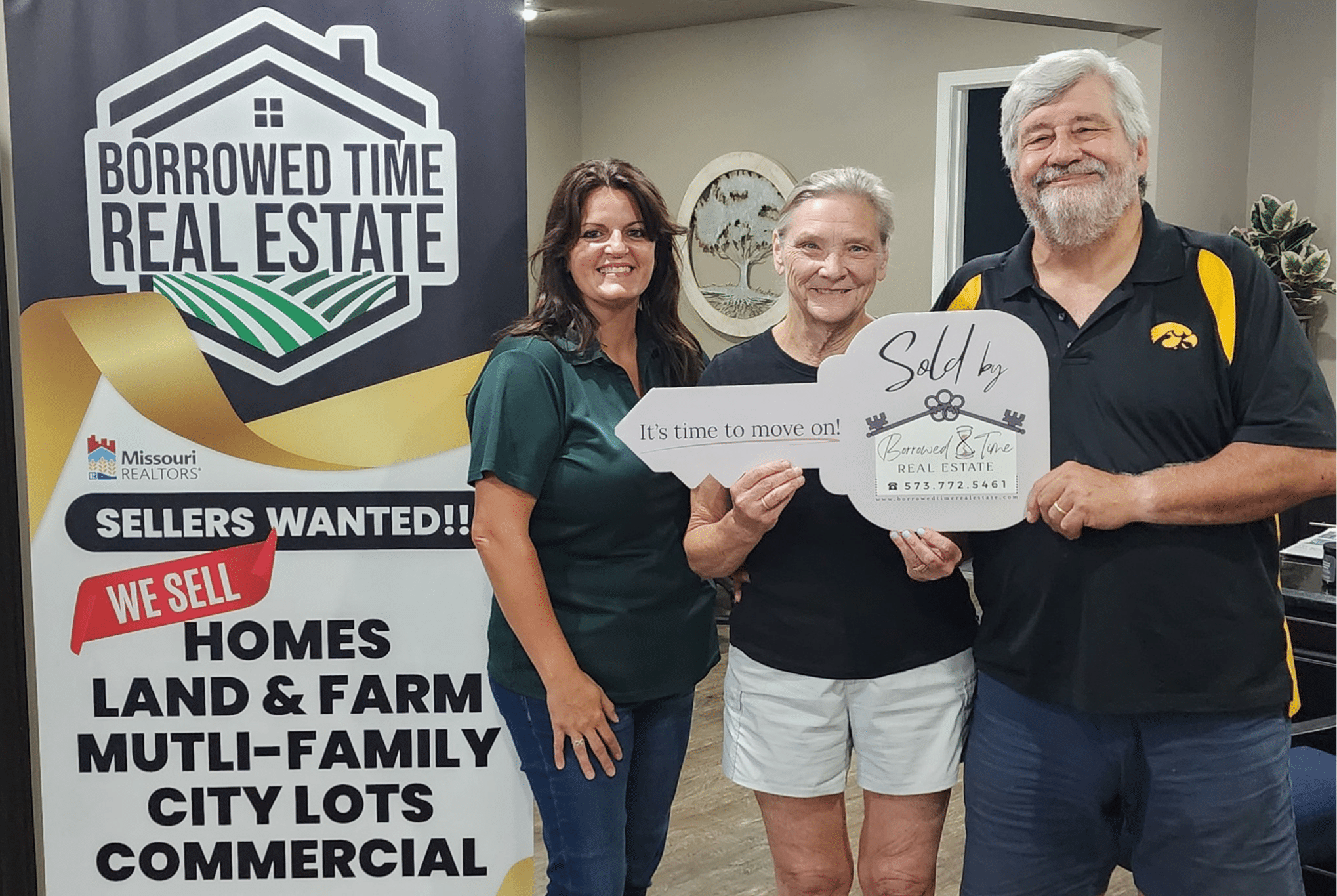 Home sellers celebrating closing day after selling with Borrowed Time Real Estate