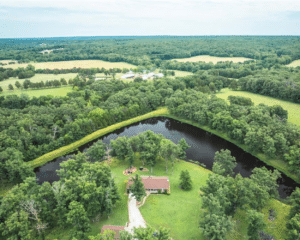 Cuba Missouri acreage property with home and large pond aerial view rural land Crawford County